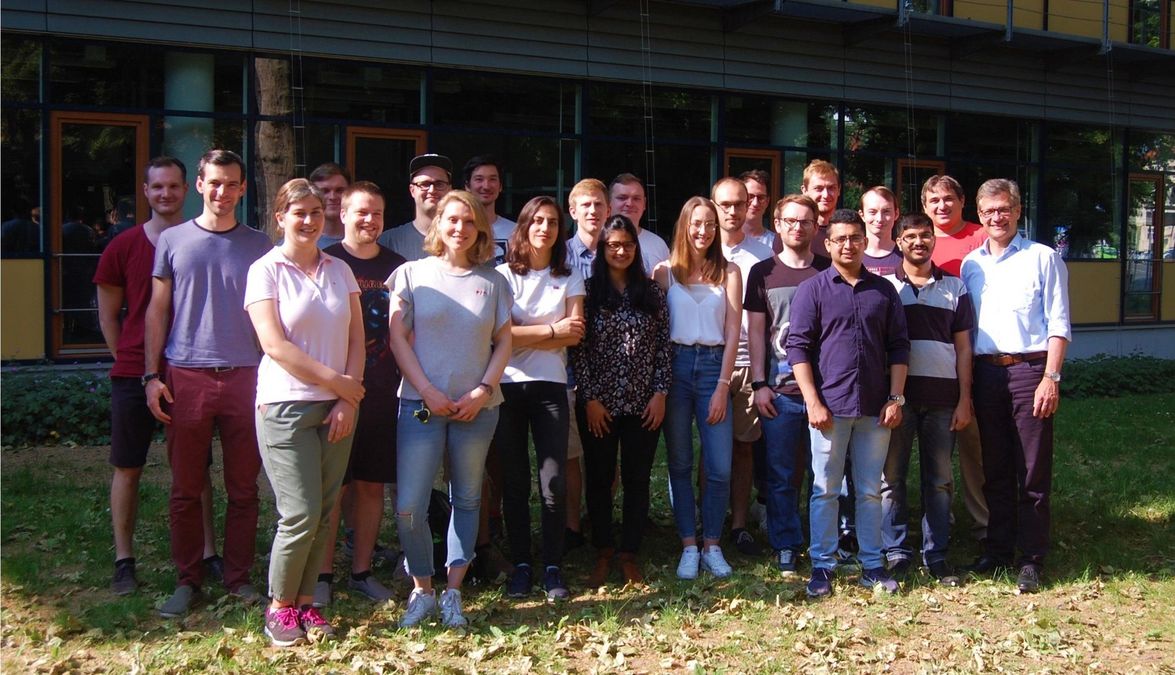 enlarge the image: The photo shows the team of the research group of Prof. C. Schneider in front of the main building of the Faculty of Chemistry and Mineralogy - Spring 2019.
